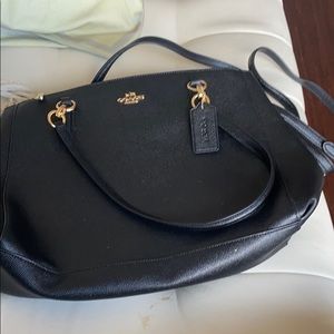 Brand new coach bag. Never used it .